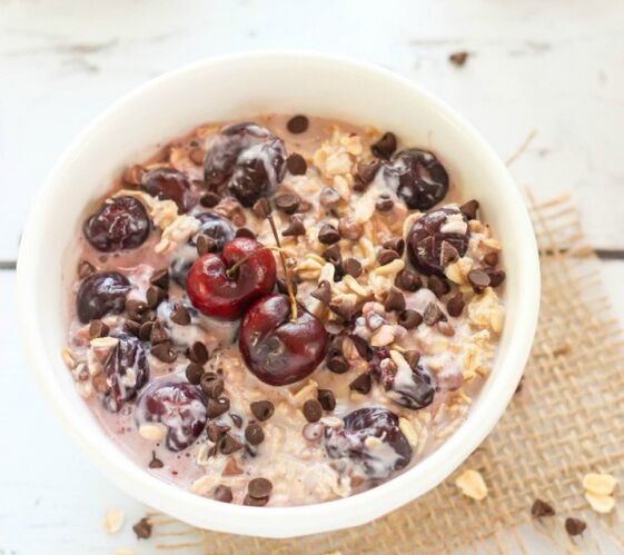 Diet oatmeal with dark chocolate and cherries. 